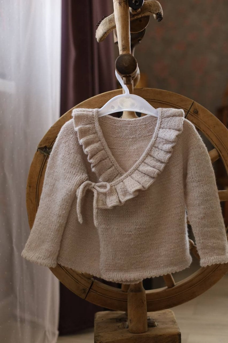 Ruffle baby jacket knitting pattern view 3