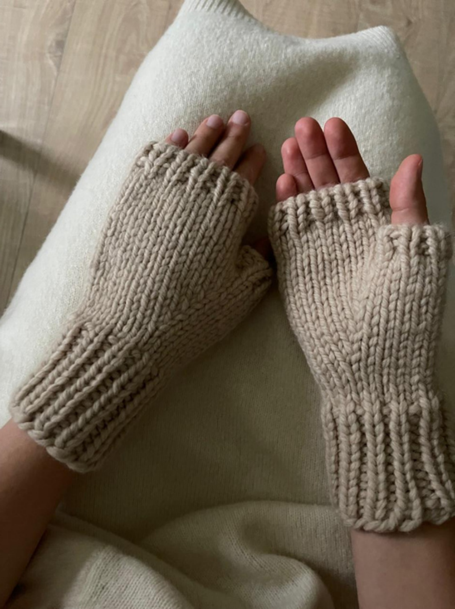 Cozy Mitts in beige, showing ribbed cuffs and shaped thumbs