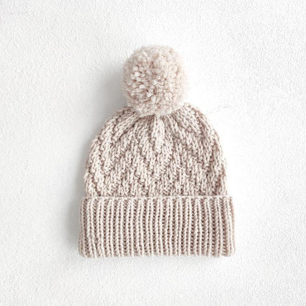 Matching herringbone hat with folded brim and pompom