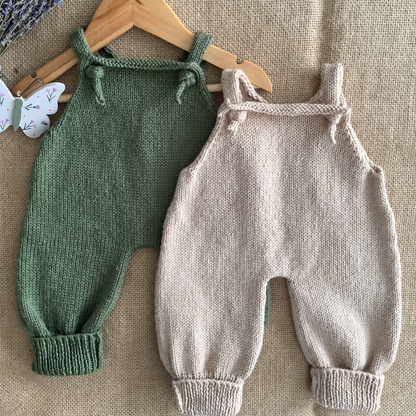 Stork baby jumpsuit knitting pattern — finished knitted outfits, view 3