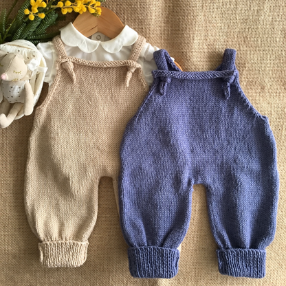 Stork baby jumpsuit knitting pattern — finished knitted outfits, view 4
