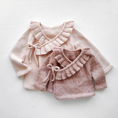 Ruffle baby jacket knitting pattern view 1